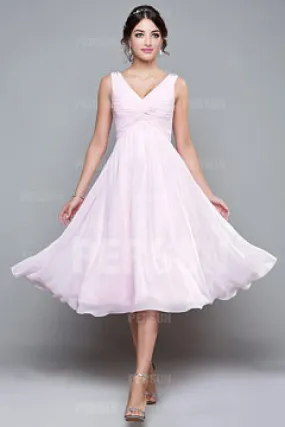 Robe rose de princesse col V plissée empire mi-longue en mousseline