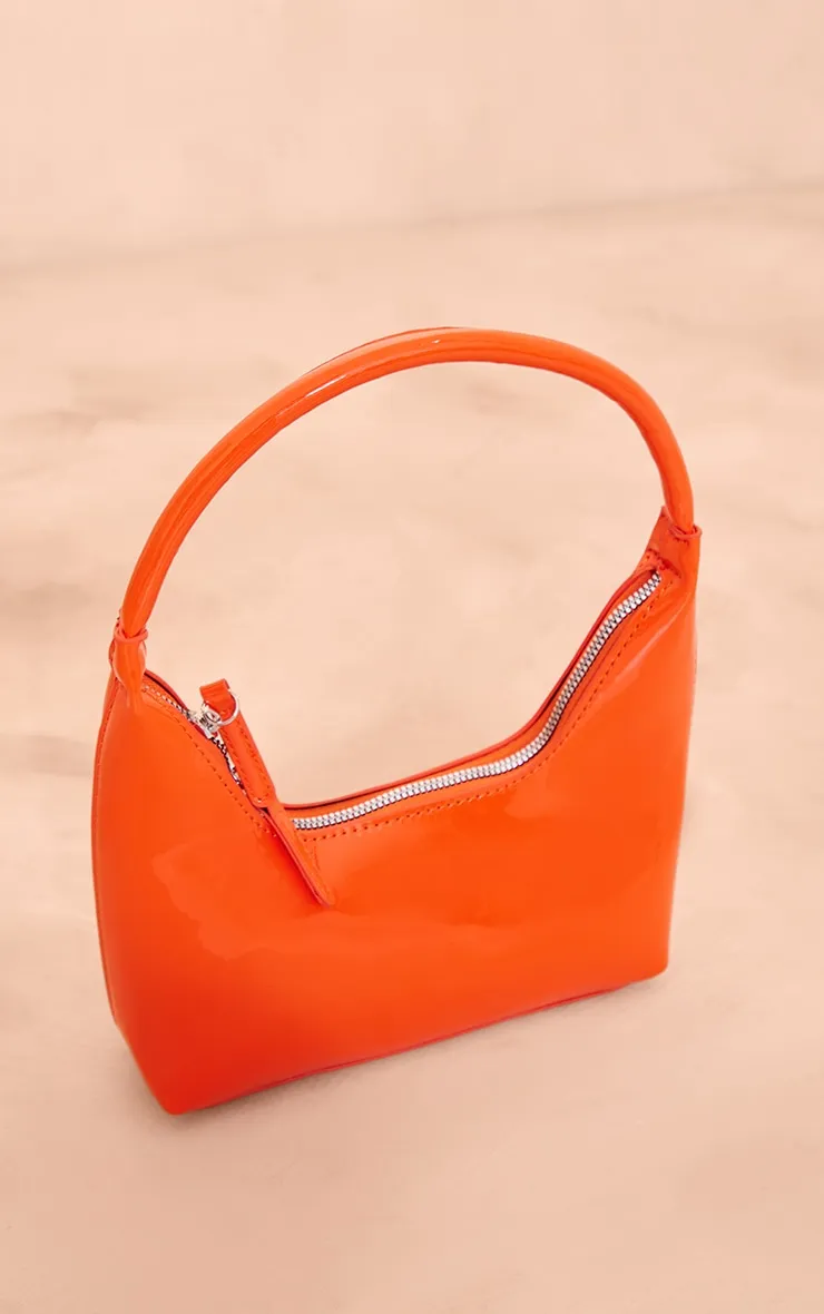 Sac à main orange verni à armature simple et double zip